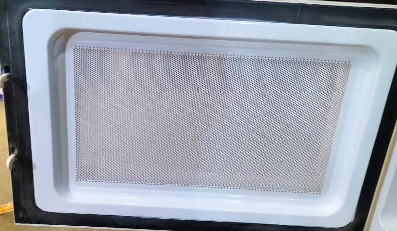 Dawlance microwave oven 100٪ working 10/10 condition 2