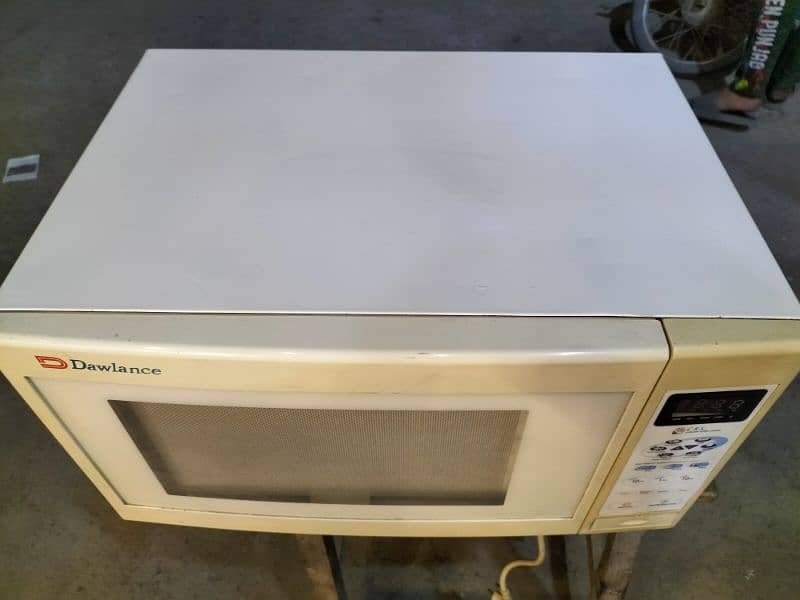 Dawlance microwave oven 100٪ working 10/10 condition 4