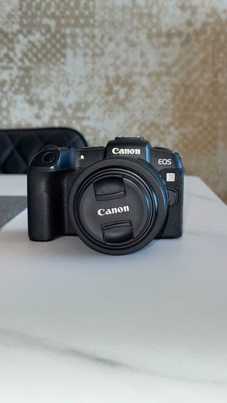 Canon EOS RP body with canon RF 35mm f 1.8 lens 0