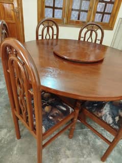 One round Dinning Table and 6 chairs