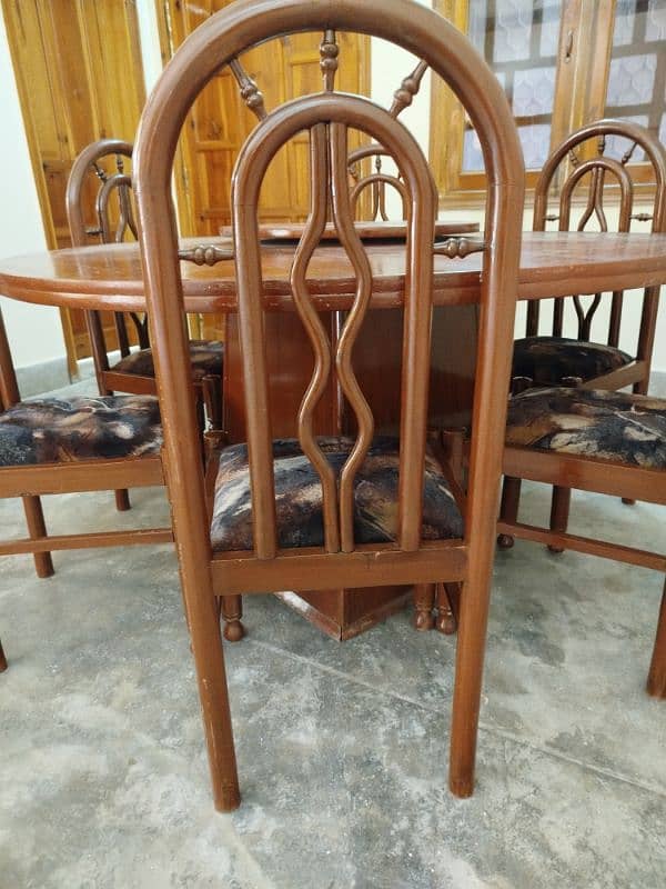 One round Dinning Table and 6 chairs 1