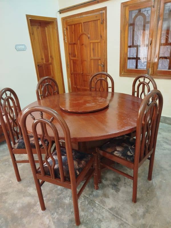 One round Dinning Table and 6 chairs 6