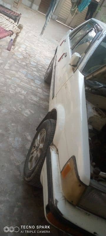 Toyota corolla gl saloon 1986 model total genuine  call 03280605356 1