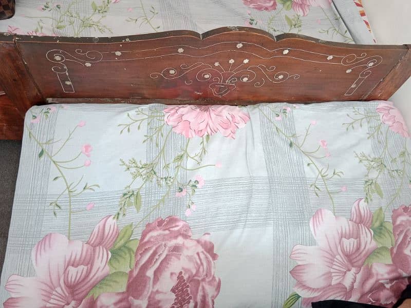 wooden single bed for sale 12k for both 0