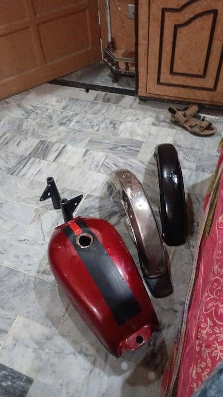 I am selling for bike spare part fuel tank mudguard horan 1