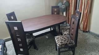 Slightly used Dinning table plus 6 chairs