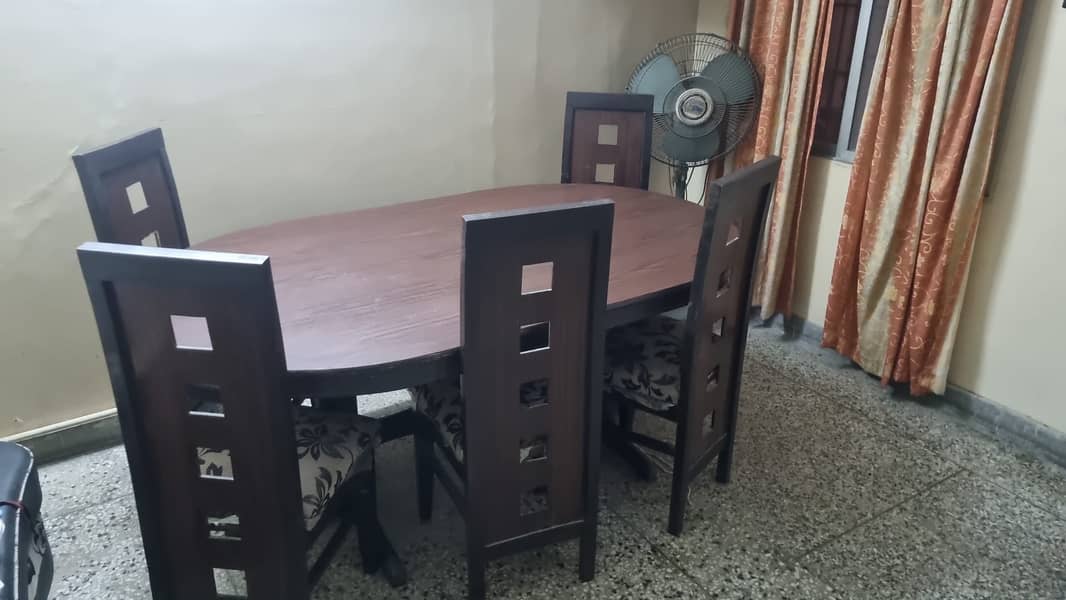 Slightly used Dinning table plus 6 chairs 1