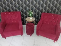 Red velvet sofas