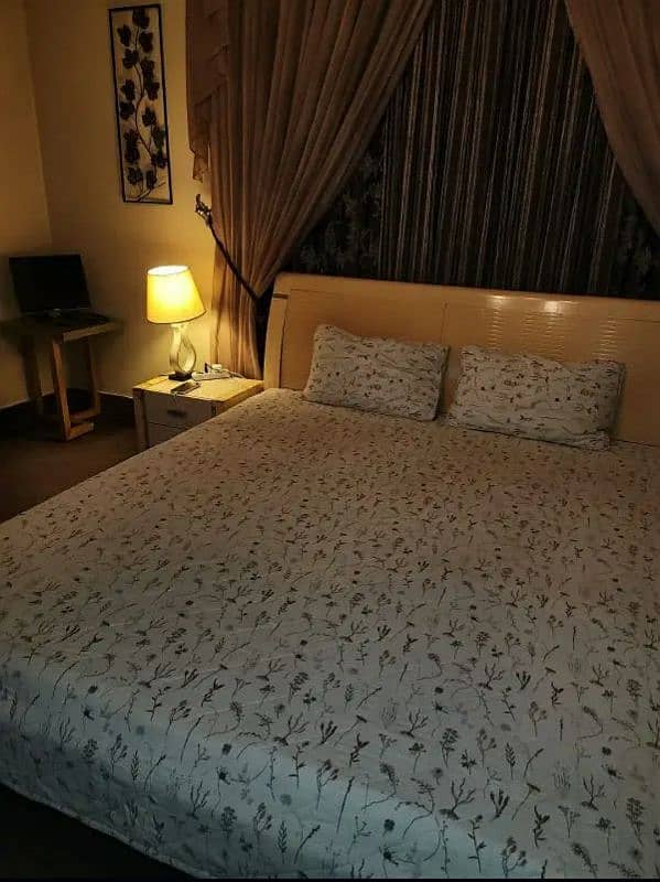 king size bed , 2 side tables, 1 dresser, led rack (unit) 03184871233 4