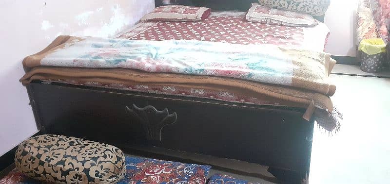 wooden bed with matress 0