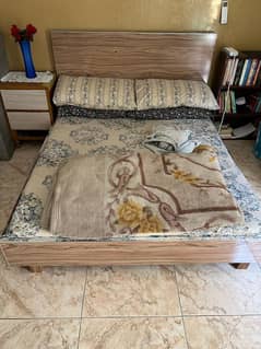 Bed with side tables