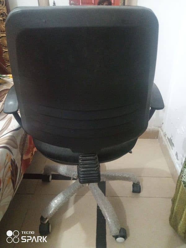 1 Table with Black Moveable Chair for sale 2