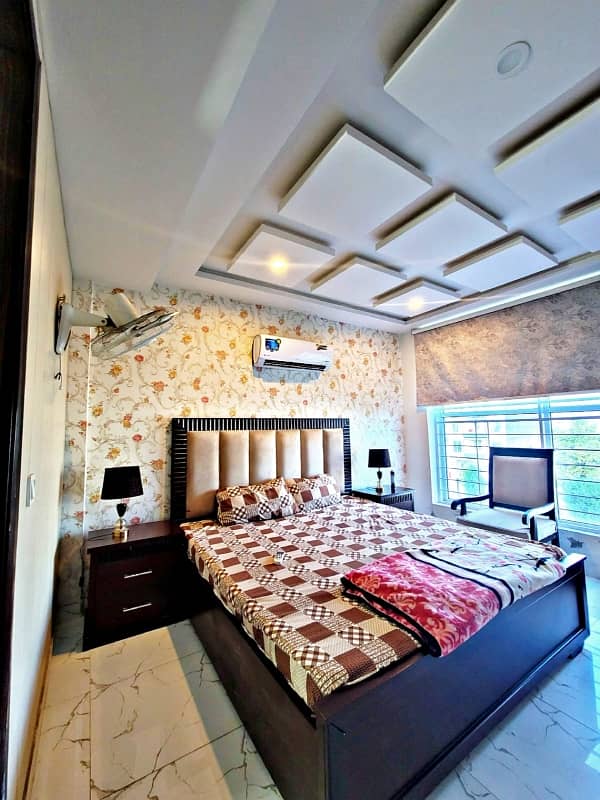 one bed room tv lunch kichan attach bathroom fully luxury furnished apartment available in bahria town Lahore 2