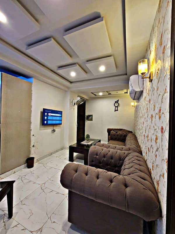 one bed room tv lunch kichan attach bathroom fully luxury furnished apartment available in bahria town Lahore 4