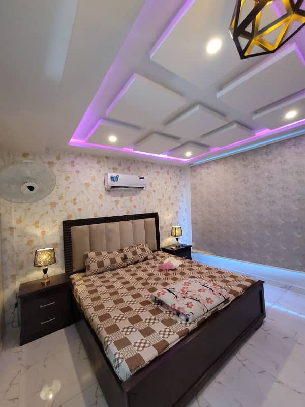 one bed room tv lunch kichan attach bathroom fully luxury furnished apartment available in bahria town Lahore 5