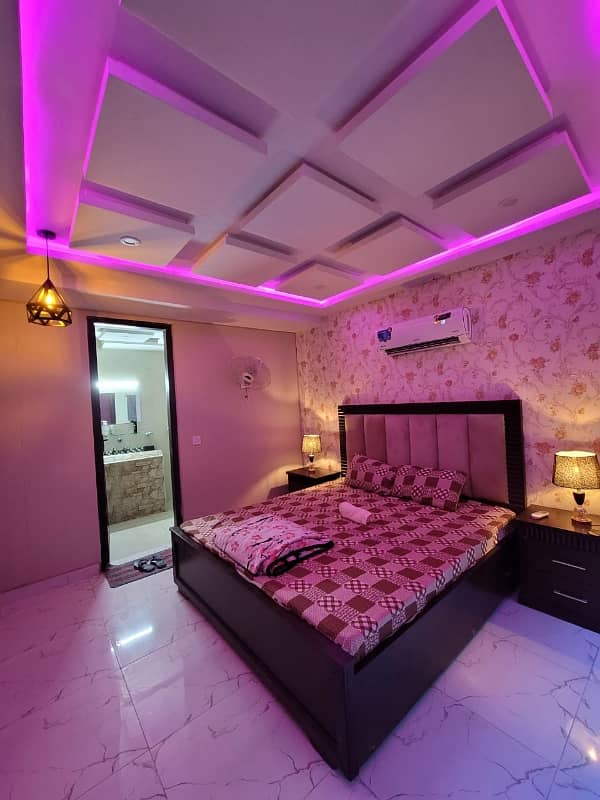 one bed room tv lunch kichan attach bathroom fully luxury furnished apartment available in bahria town Lahore 6