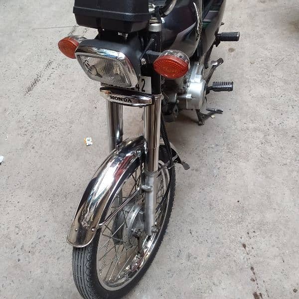 Honda cg 125 model 2023 first owner all ok koi Kam ni hony wala 9