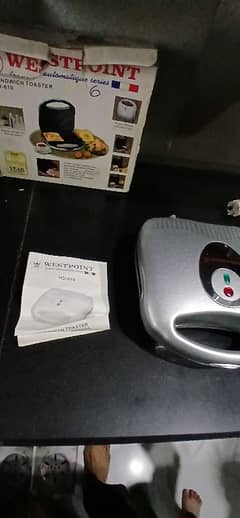 brand new sandwich maker only box open with manual and everything