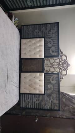 selling fooden king bed with a side table