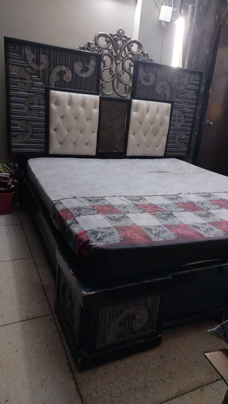 selling fooden king bed with a side table 1