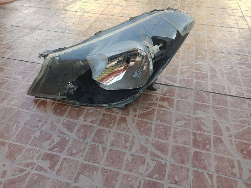 Toyota vitz 2013 bumper and headlight 1