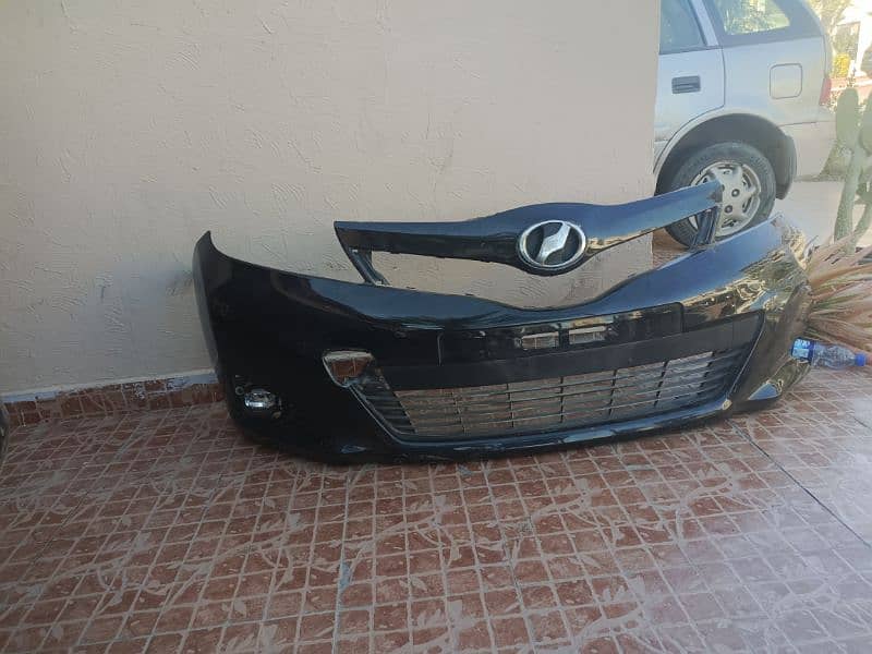 Toyota vitz 2013 bumper and headlight 4