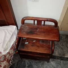 Wooden bed with dressing table with side tables