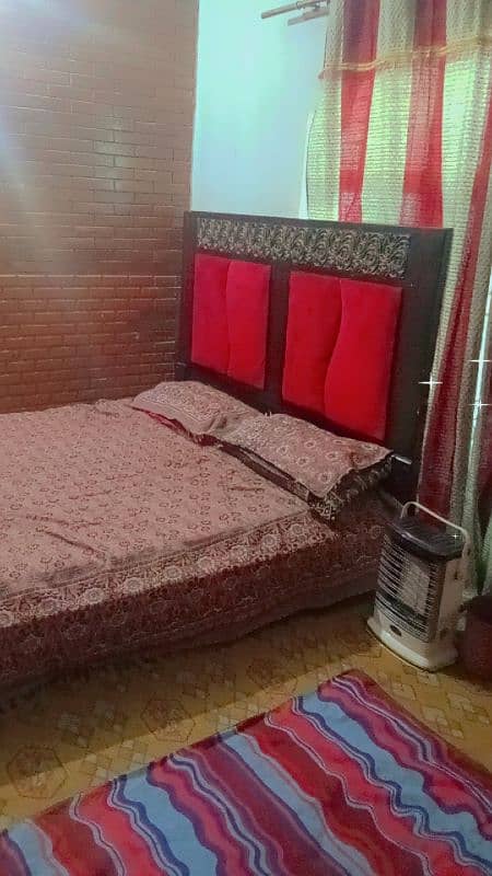 wooden bed with 2 side tables 1