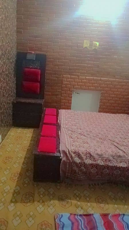 wooden bed with 2 side tables 2