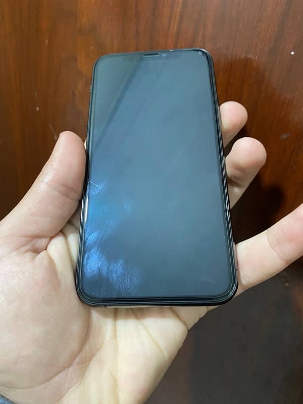 iphone 11 pro in good condition 73% battery health 64gb water pack 2