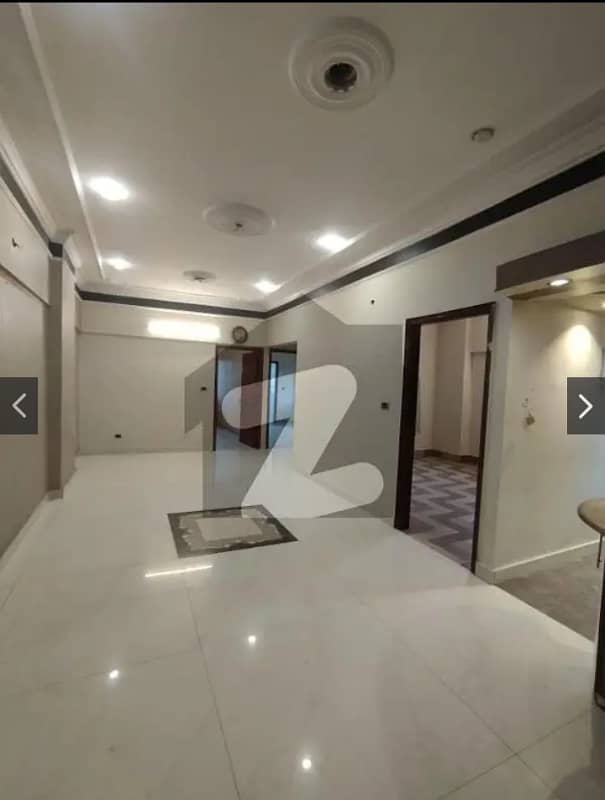 Commissioner Society 120 yards available for rent, featuring 2 bedrooms, drawing room, lounge, modern American kitchen, and marble flooring. With 24 hours electricity and water supply 7