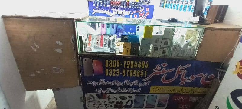 mobile shop Ka Sara sman with accessories 2