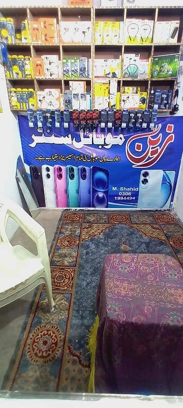 mobile shop Ka Sara sman with accessories 6