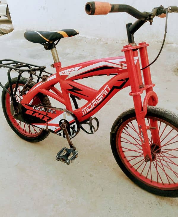 bicycle impoted 16 inch 5 to. 9 year old used call no 0314.950. 5437 0