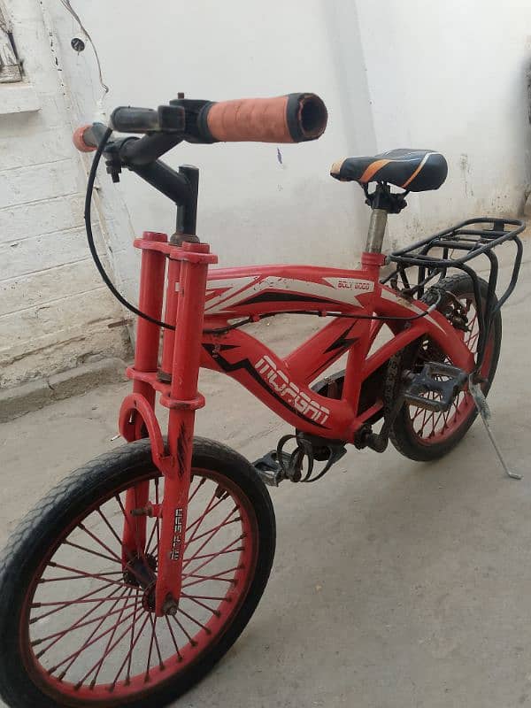 bicycle impoted 16 inch 5 to. 9 year old used call no 0314.950. 5437 1