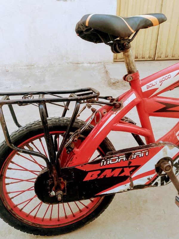 bicycle impoted 16 inch 5 to. 9 year old used call no 0314.950. 5437 2