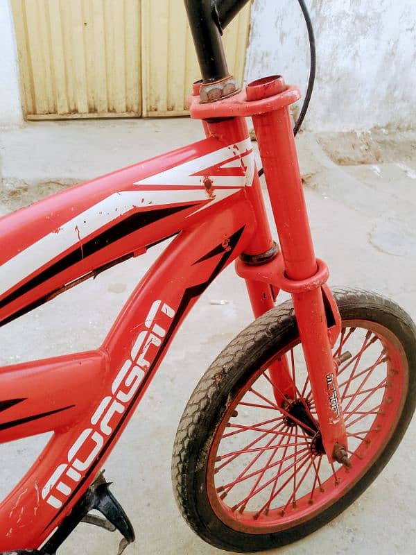 bicycle impoted 16 inch 5 to. 9 year old used call no 0314.950. 5437 3