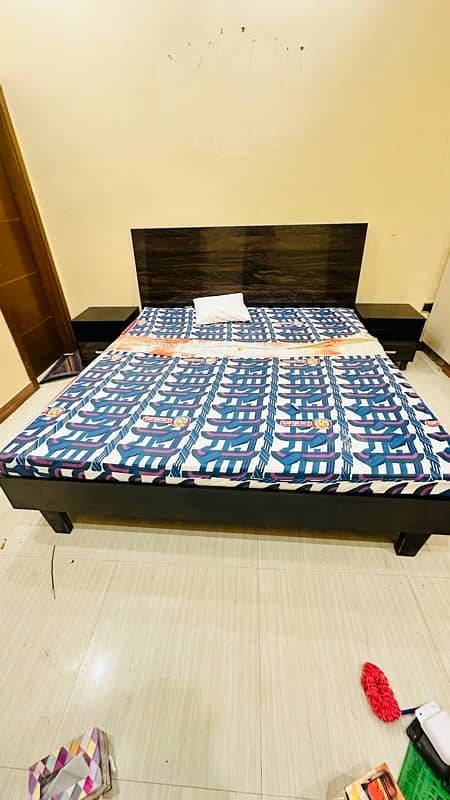 Habitt brown bed with mattress and side tables 1