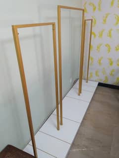 Two clothes hanging stands for shop