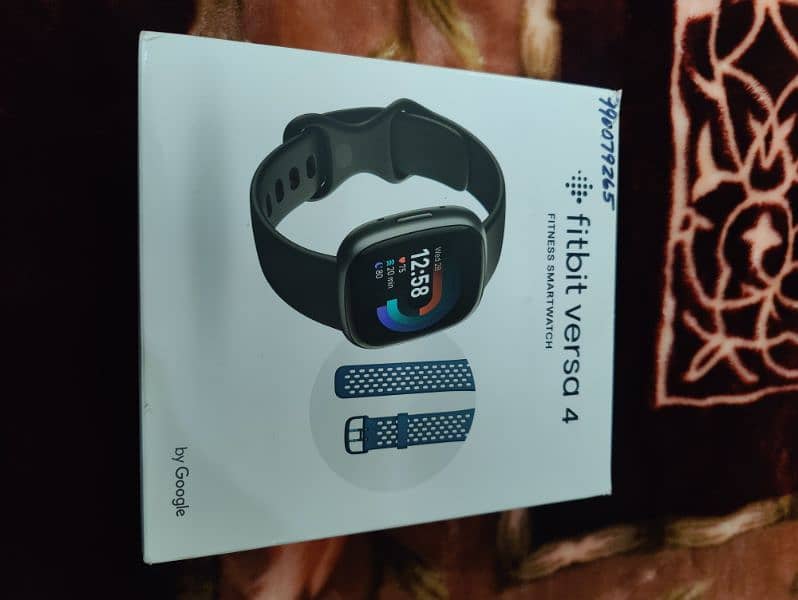 Fitbit versa 4 with box All accessories. 0