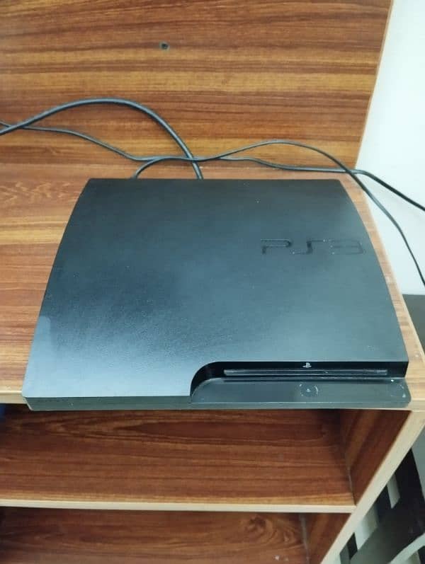 PS3 with Jail Break & 20 plus Games & DVDs 6