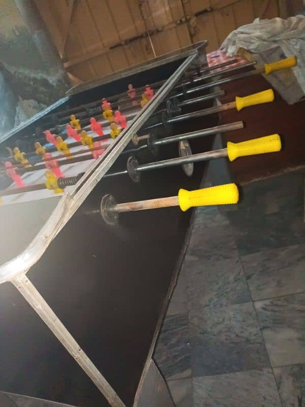 Foosball. . . . Bawye game. . Only sell just sell used but new like 2