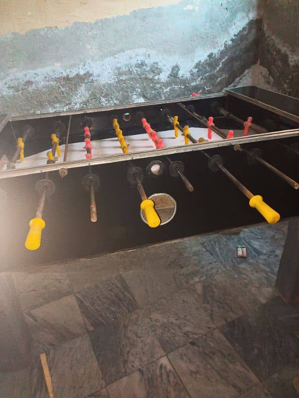 Foosball. . . . Bawye game. . Only sell just sell used but new like 4