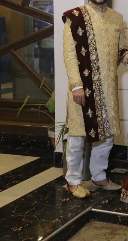 beige color sherwani, khussa and mahroon qula 0