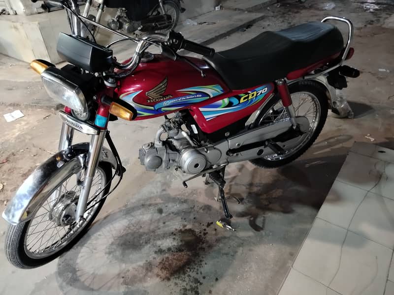 Honda CD 70 2024 4