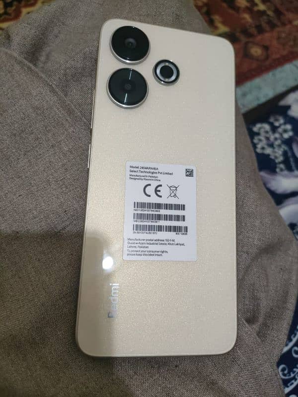 Redmi 13    8/128 1 month used 10/10 condition with box and charger 0