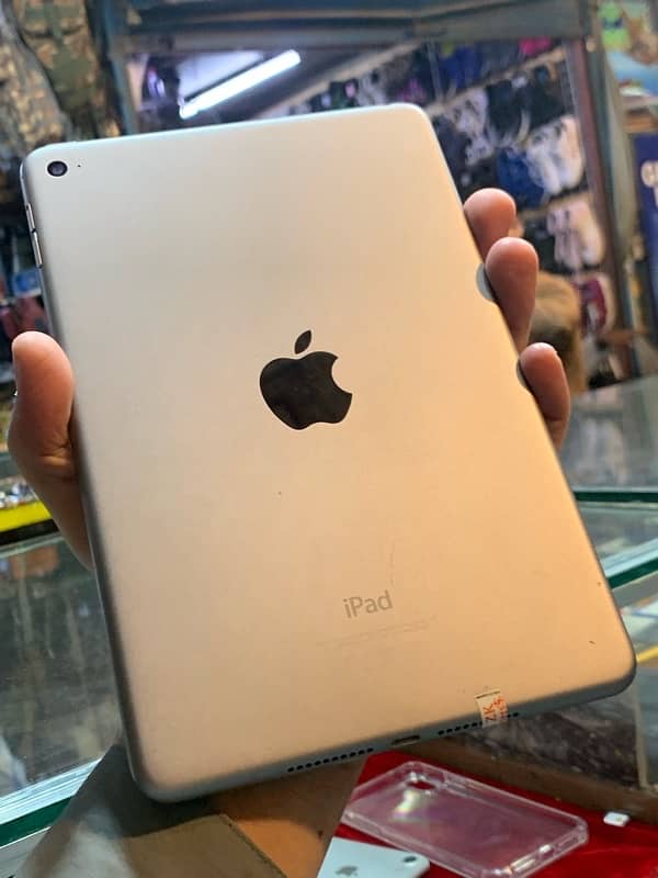 iPad mini 4 …. . 128……  03351276059 WhatsApp  number 7