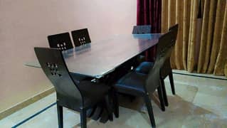 Pure wooden base with top heavy glass table