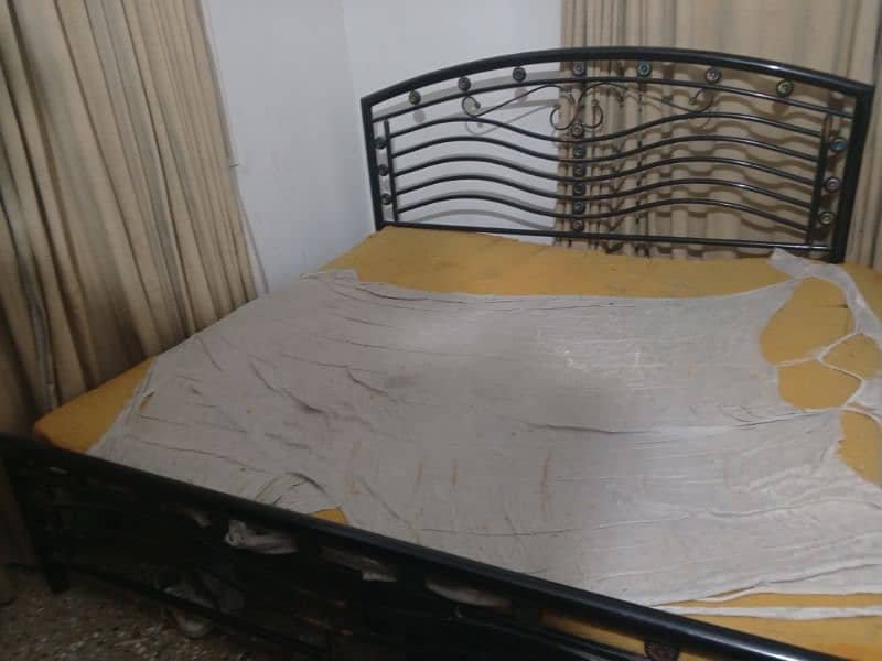 Double bed with mattress , 1