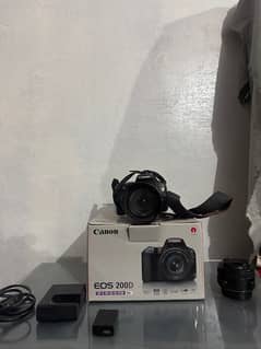 cannon 200D with kit lens and 50mm lens and Box